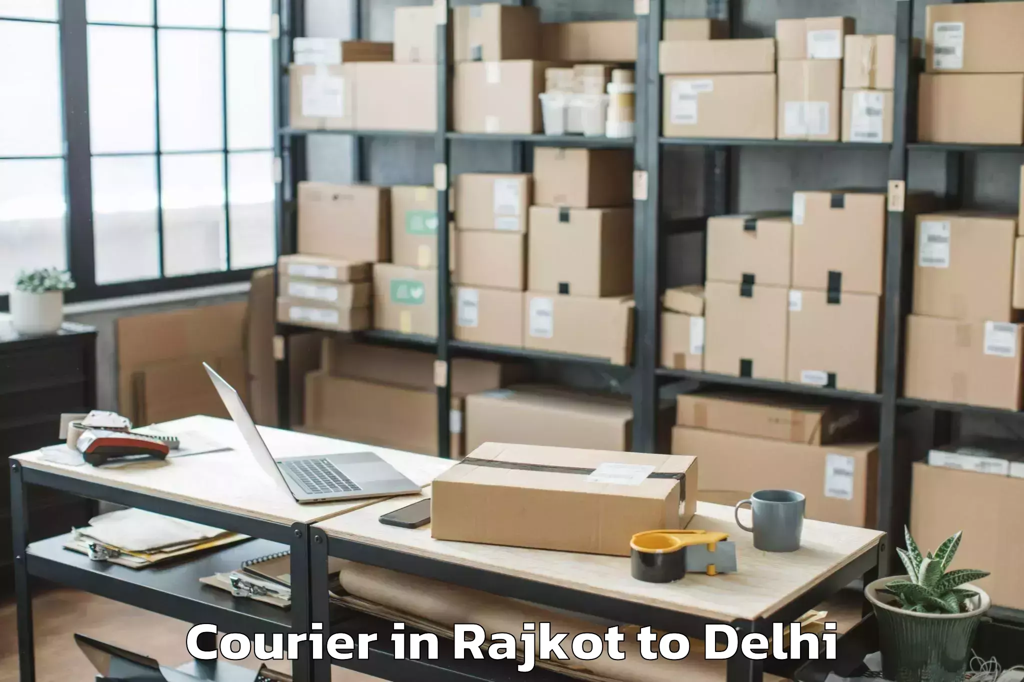 Reliable Rajkot to Sansad Marg Courier